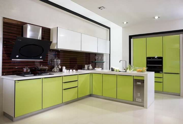 L- Shaped Modular Kitchen in Green Colour with Upper Cabinets, Recessed Lighting & Glossy Wooden Kitchen Backsplash