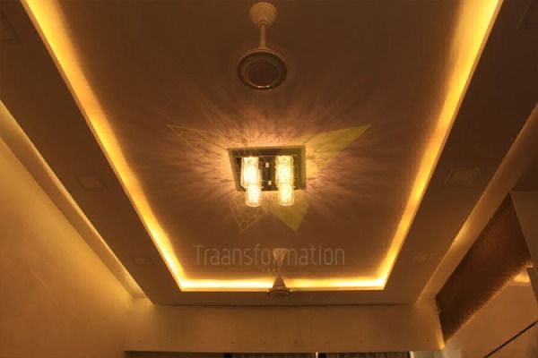 POP False Ceiling for Rectangle Room with Attractive Chandelier in Centre & Cove lights Around